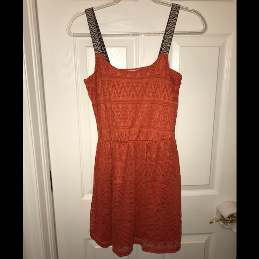 Orange lace dress with geometric pattern